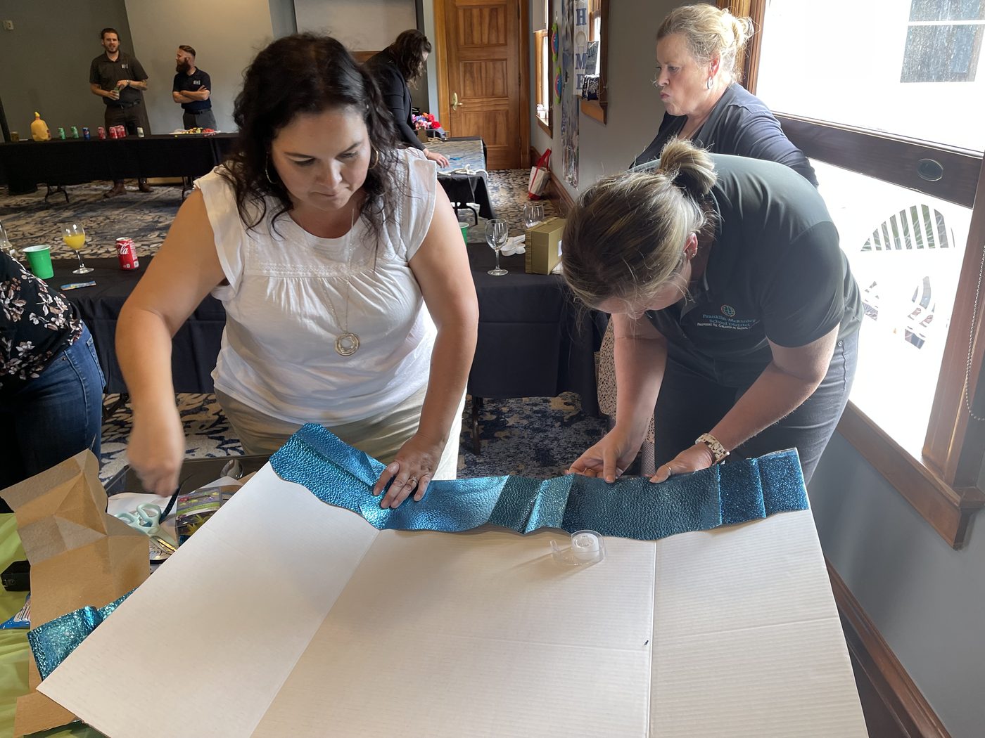 A pair designing the cantina presentation