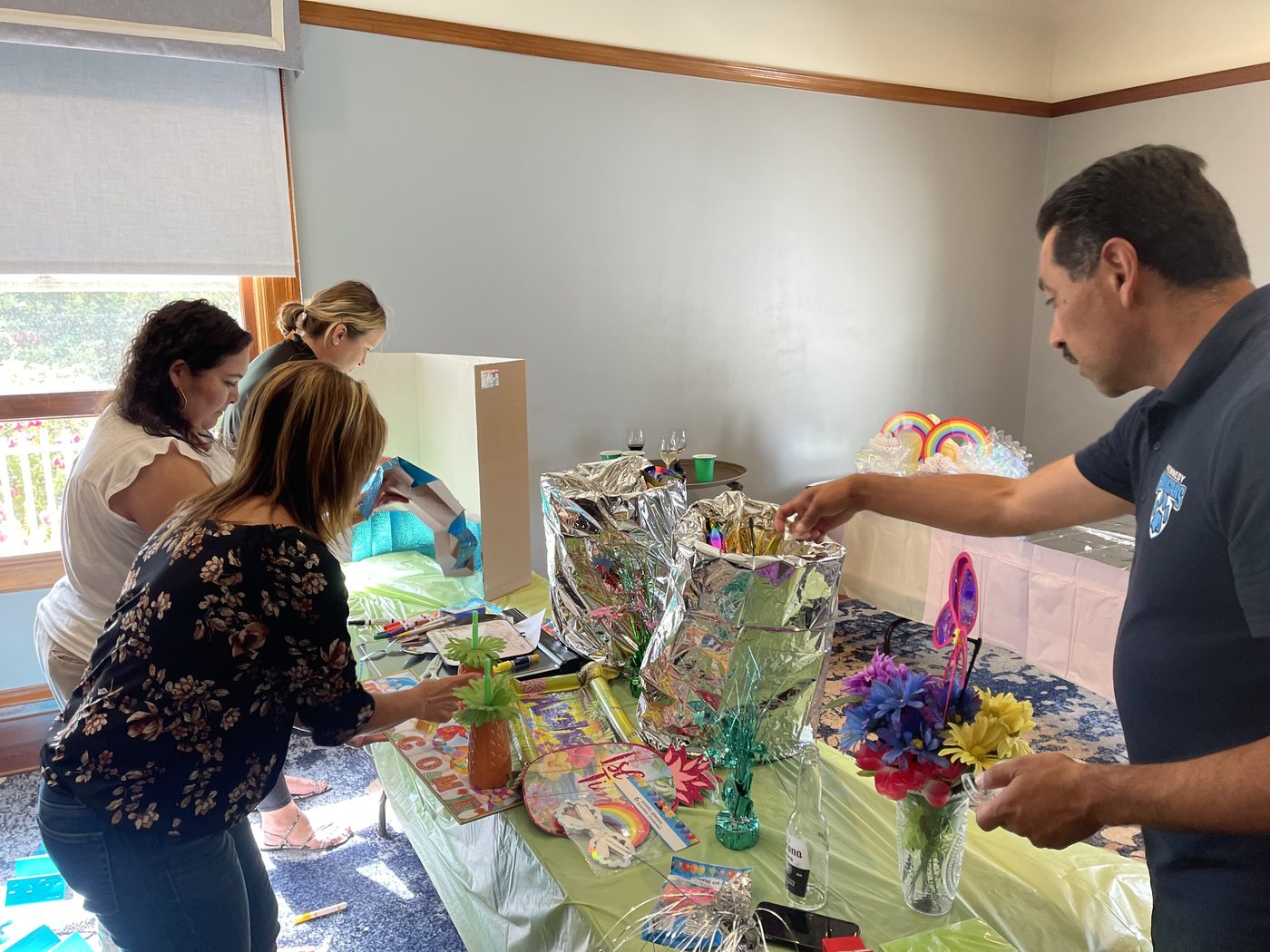 Teammates sampling a creation at the decorated counter
