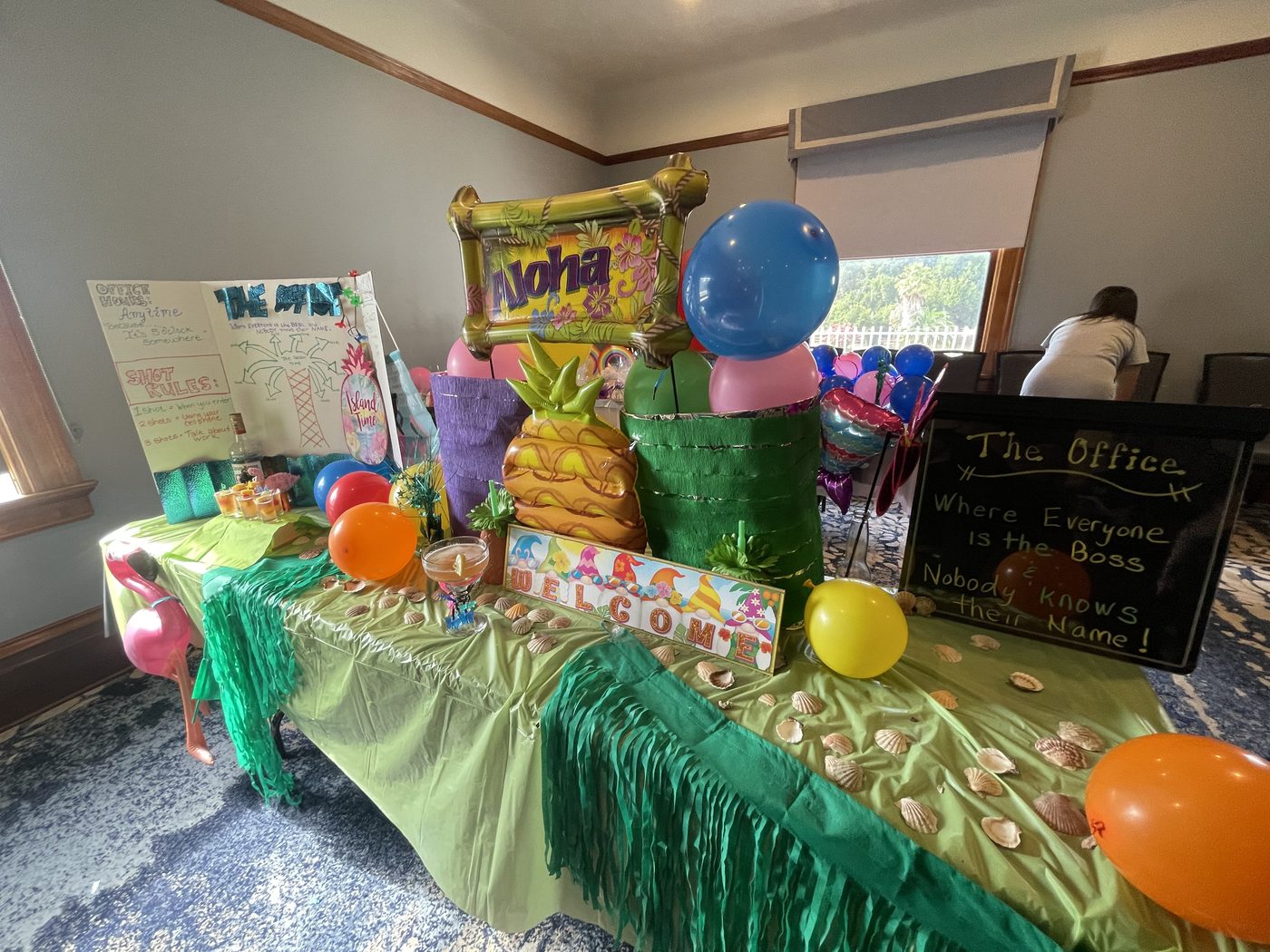 A colorful cantina with balloons and a handmade menu