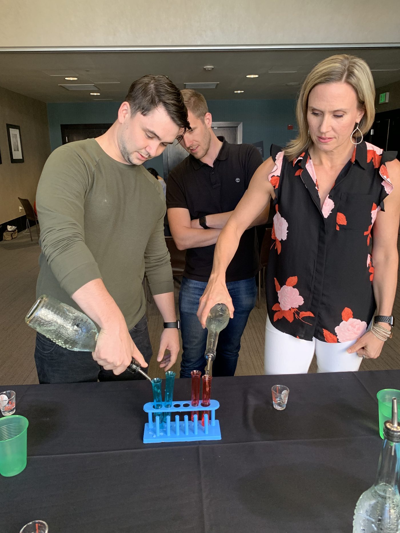 A pair competing in a tabletop mini challenge